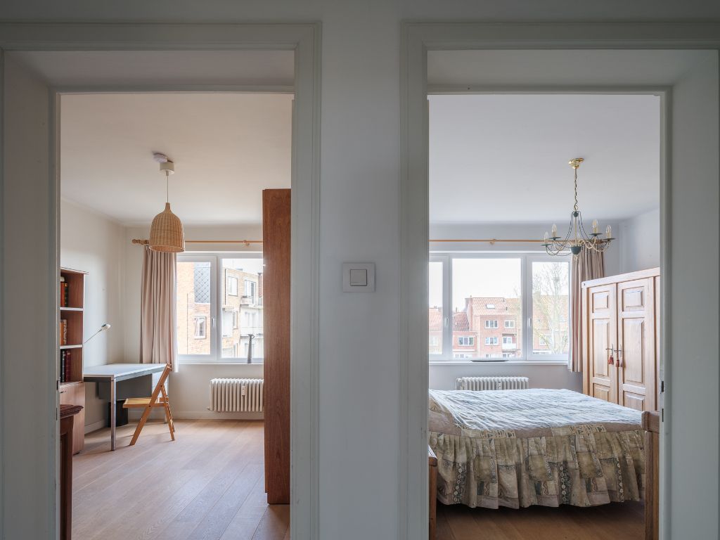 Lichtrijk appartement met 2 volwaardige slaapkamers, inpandig terras en gemeenschappelijke tuin, in een residentiële straat nabij het station Gent-Sint-Pieters. foto 11