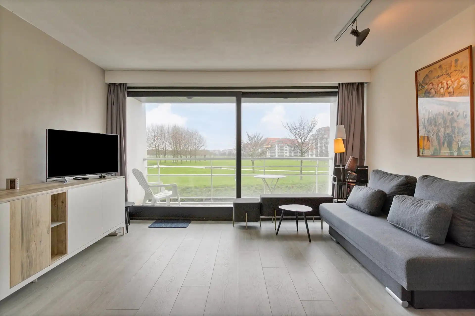 Studio met zongericht terras en open zicht op park en Havengeul. foto 2