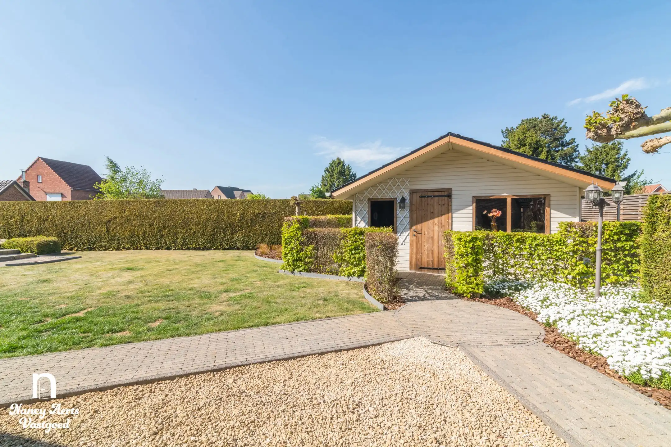 Instapklare woning met goed draaiende kapperszaak aan huis foto 12