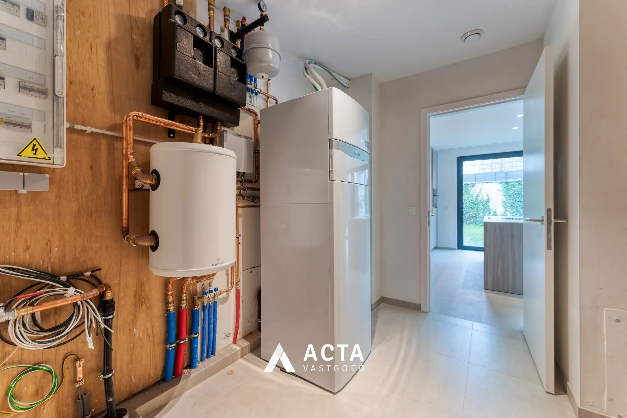 Nieuwbouwwoning met drie slaapkamers en tuin in hartje Mariakerke! foto 13