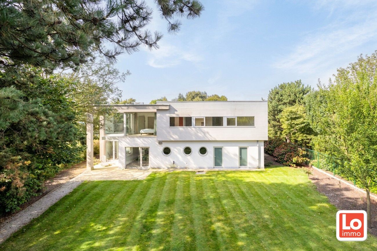 Schitterend gelegen moderne villa met praktijkruimte op een TOP ligging in de rust van de ‘Kasteeldreef’ en toch pal in centrum van Lochristi. foto 49