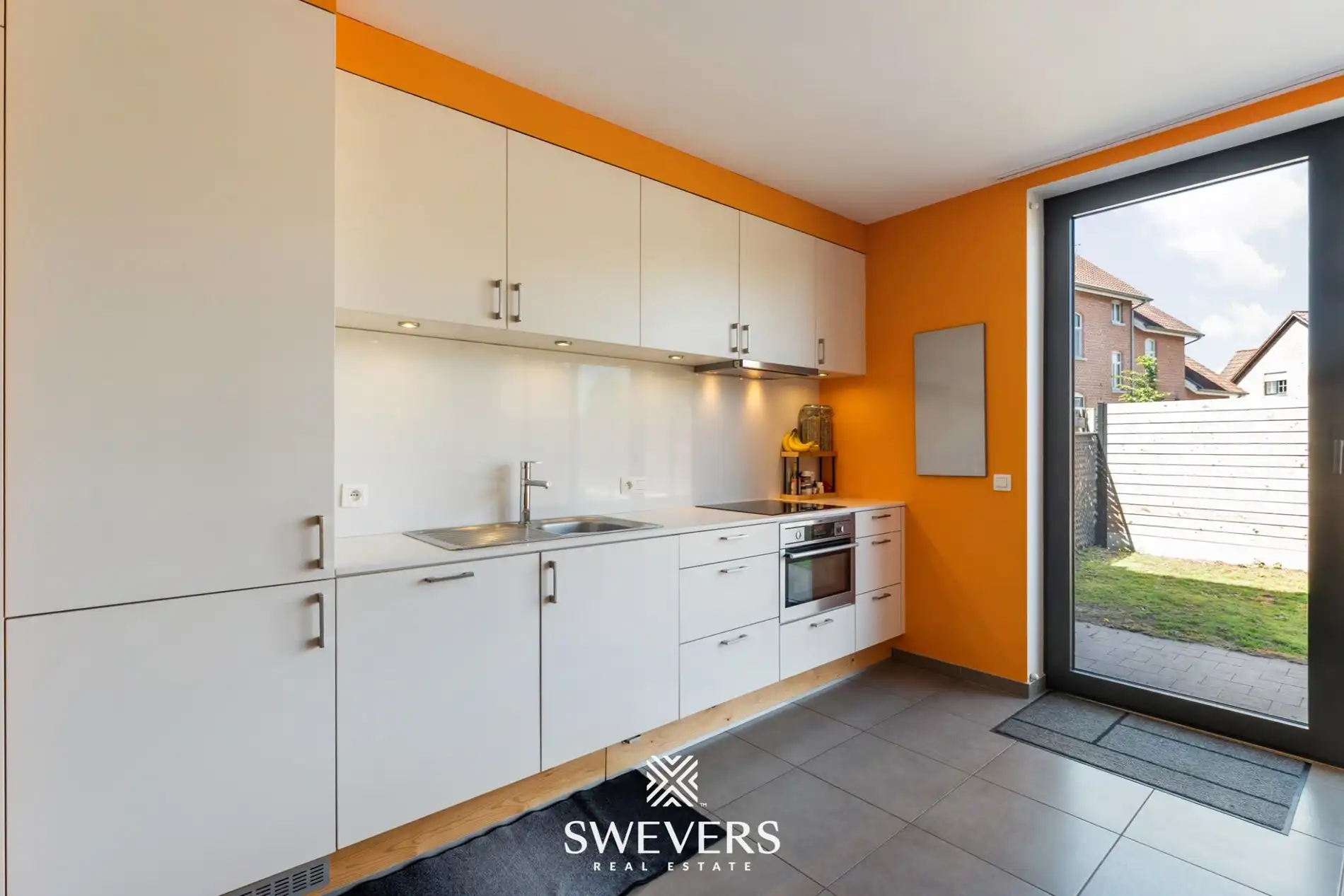Instapklare halfopen woning met 3 slaapkamers in rustige straat te Beverlo foto 12