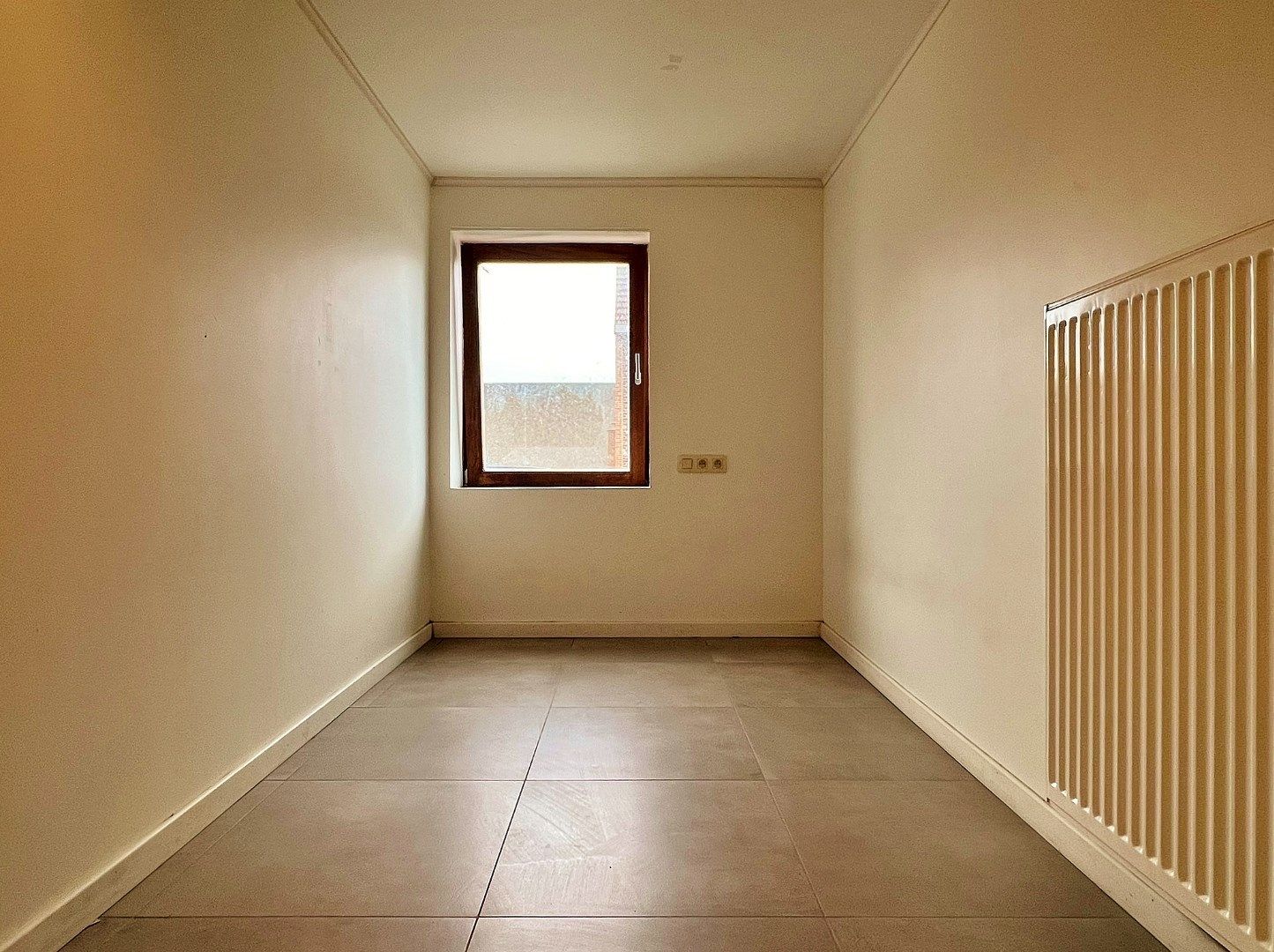 Gelijkvloers appartement met koer en autostandplaats  foto 4