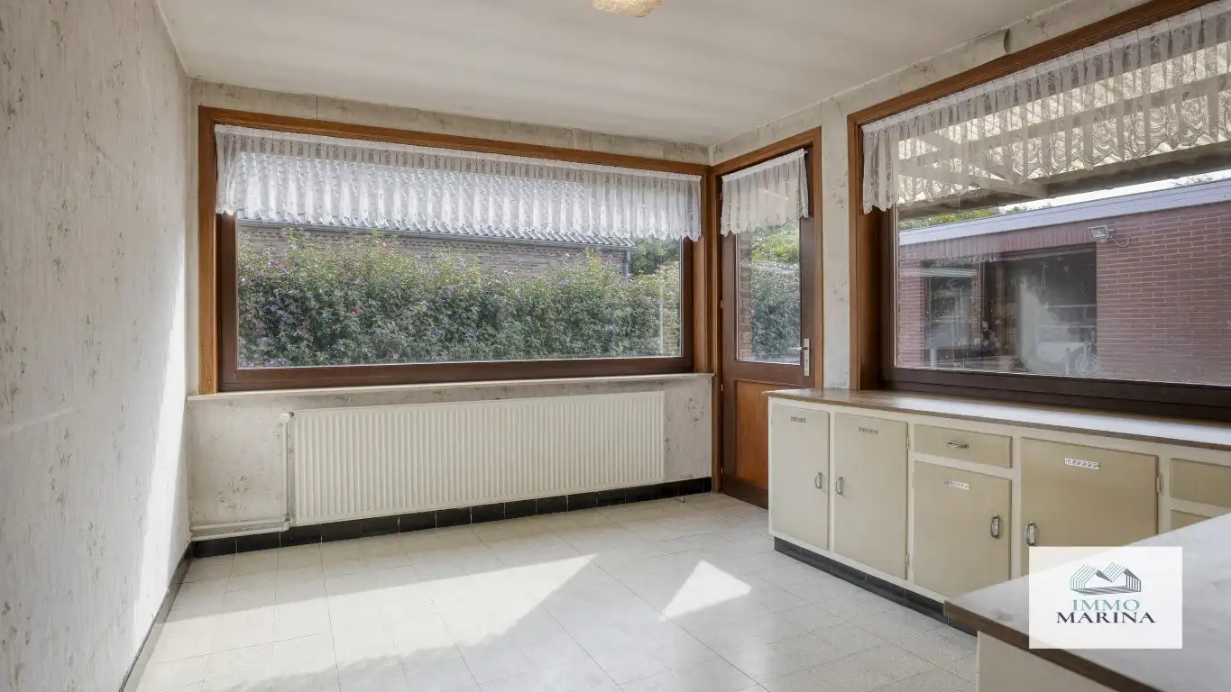 Te renoveren woning op een mooi perceel van ca. 11a 96ca in Tremelo foto 4