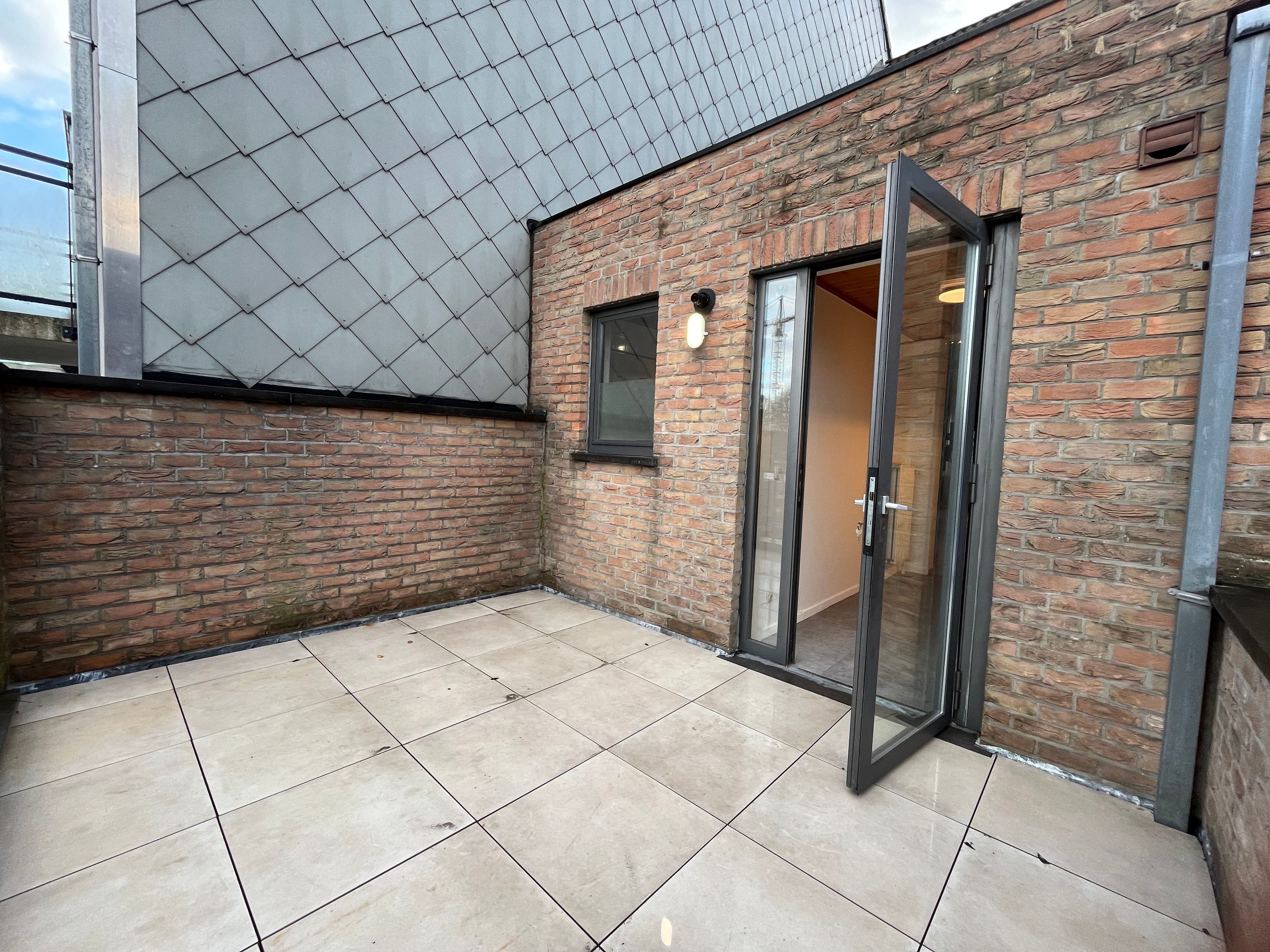 Gezellig, tof duplex-appartement met zonneterras 12m2 in centrum Deinze foto 17