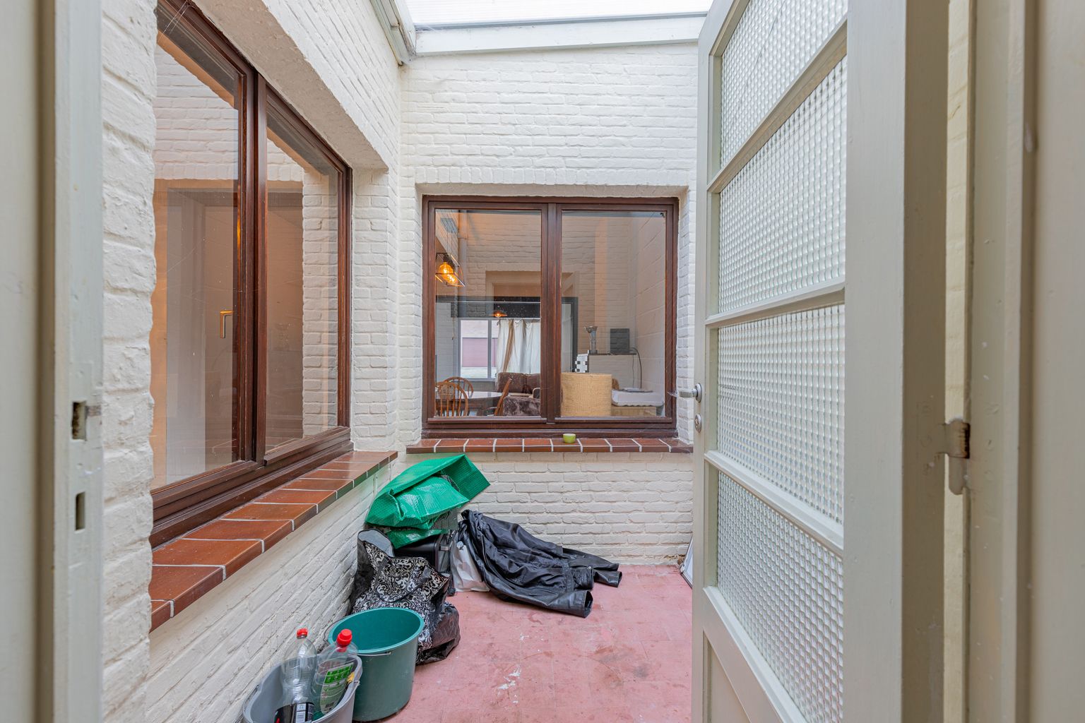 Te renoveren woning, dicht tegen het centrum van Buggenhout! foto 17