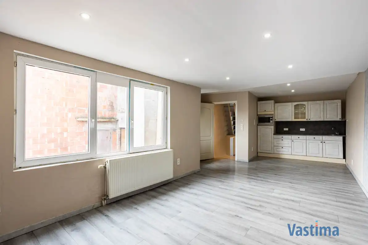 Op te frissen woning met potentieel in Erembodegem foto 8