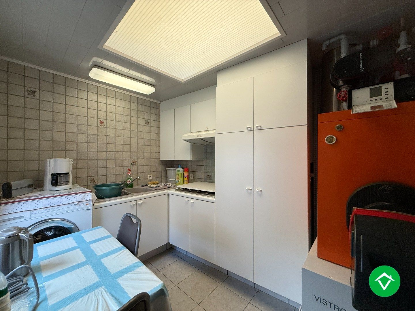 Karaktervolle, stevige woning met 4 slaapkamers, tuin en garage in centrum Roeselare foto 10