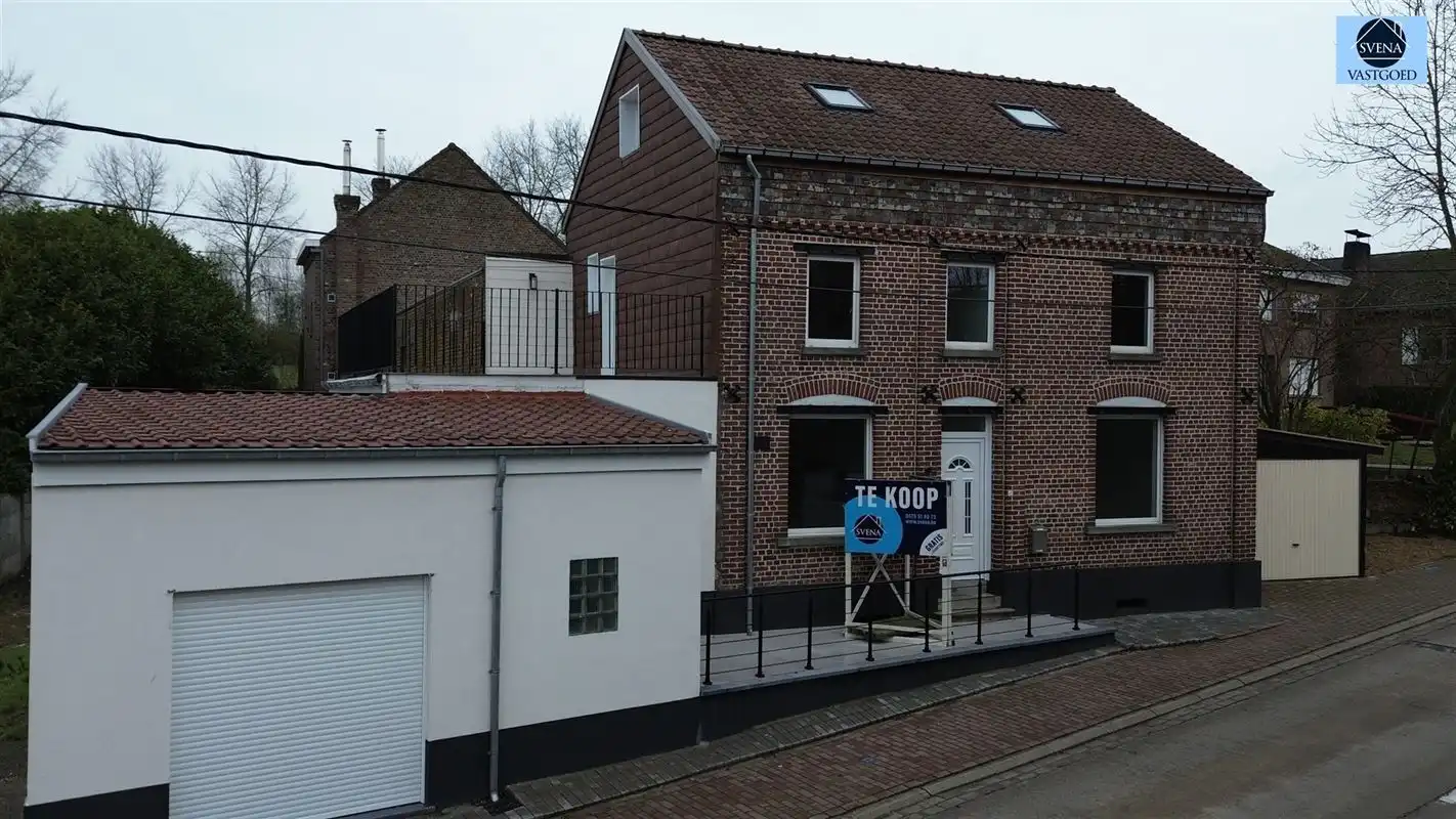 ZEER RUIME WONING MET 4 SLAAPKAMERS EN 2 GARAGES foto 27