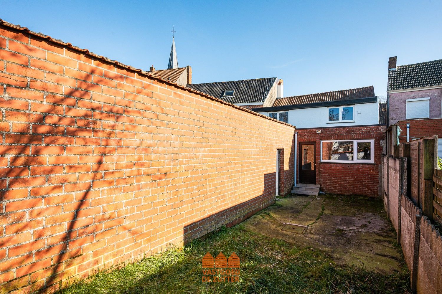 Ruime woning met handelspand in het centrum van Boekhoute foto 18