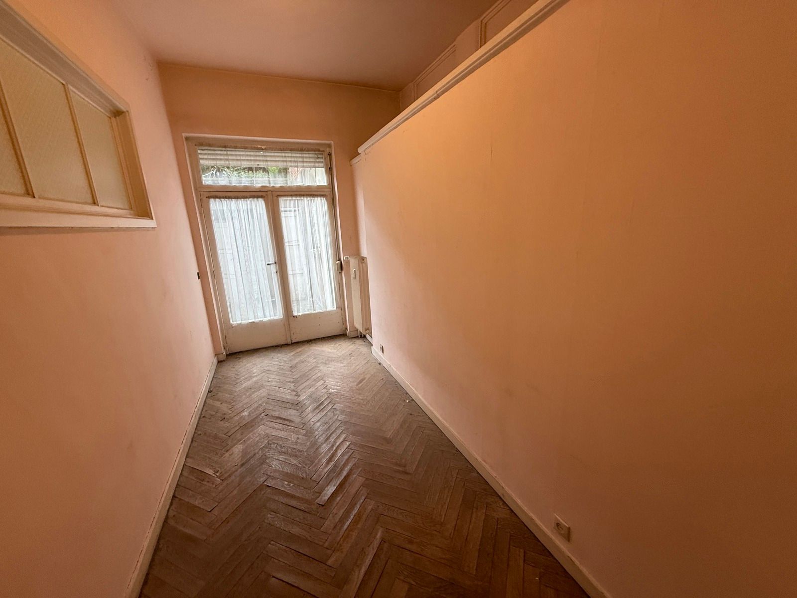 Te renoveren gelijkvloers appartement met 2 slaapkamers foto 7
