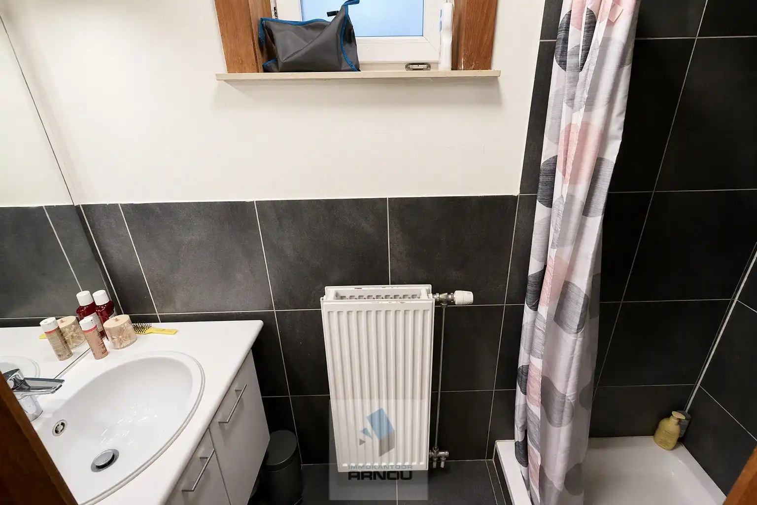 Gezellig gelijkvloers appartement met 1 slaapkamer, stadstuintje en privatieve autostaanplaats foto 10
