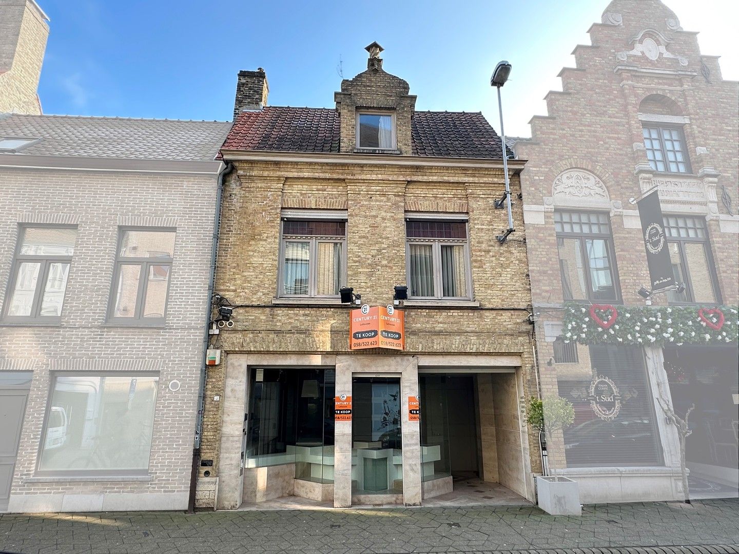 Welgelegen handelspand met ruim appartement. foto 15