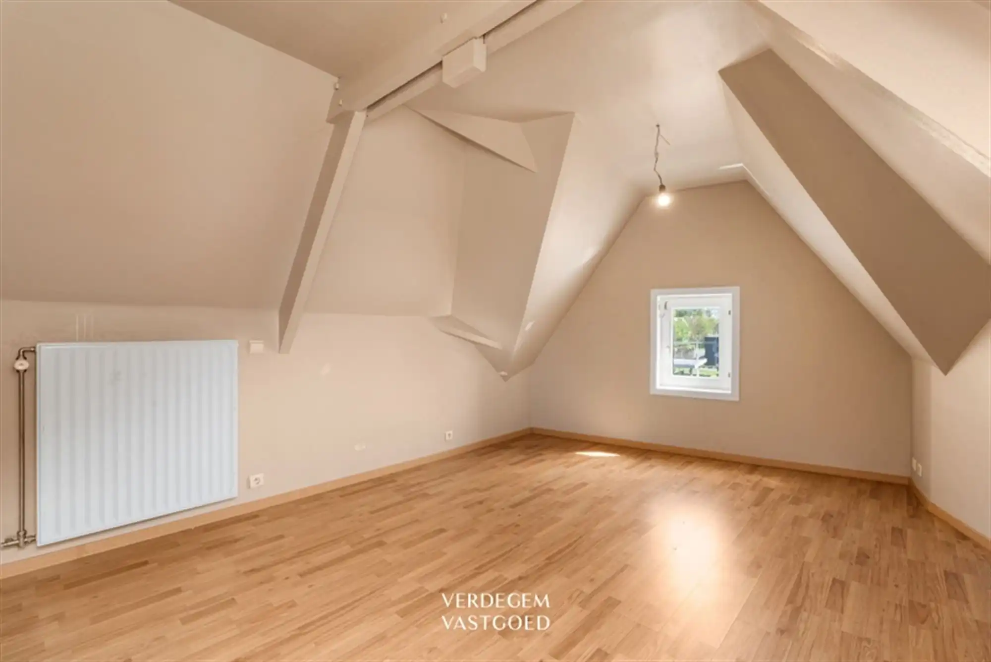 Opbrengsteigendom met 2 appartementen en 4 garages in het centrum van Sleidinge  foto 11
