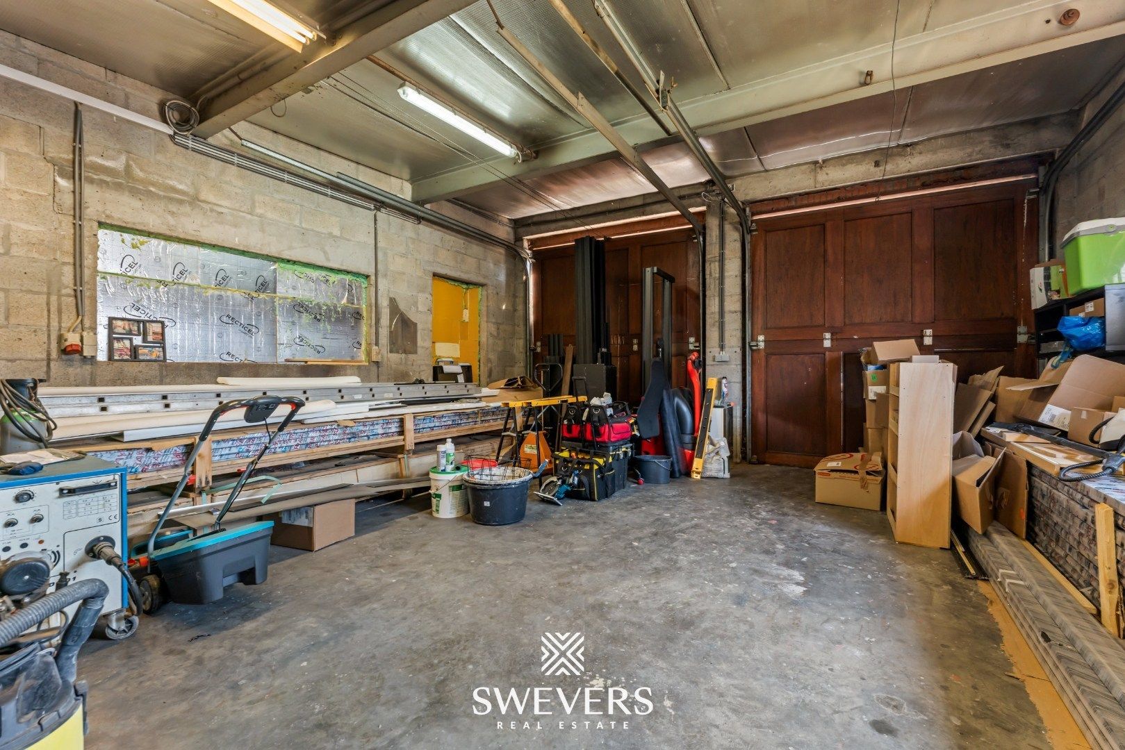 Instapklare, volledig gerenoveerde woning met zonnige tuin en grote garage foto 27