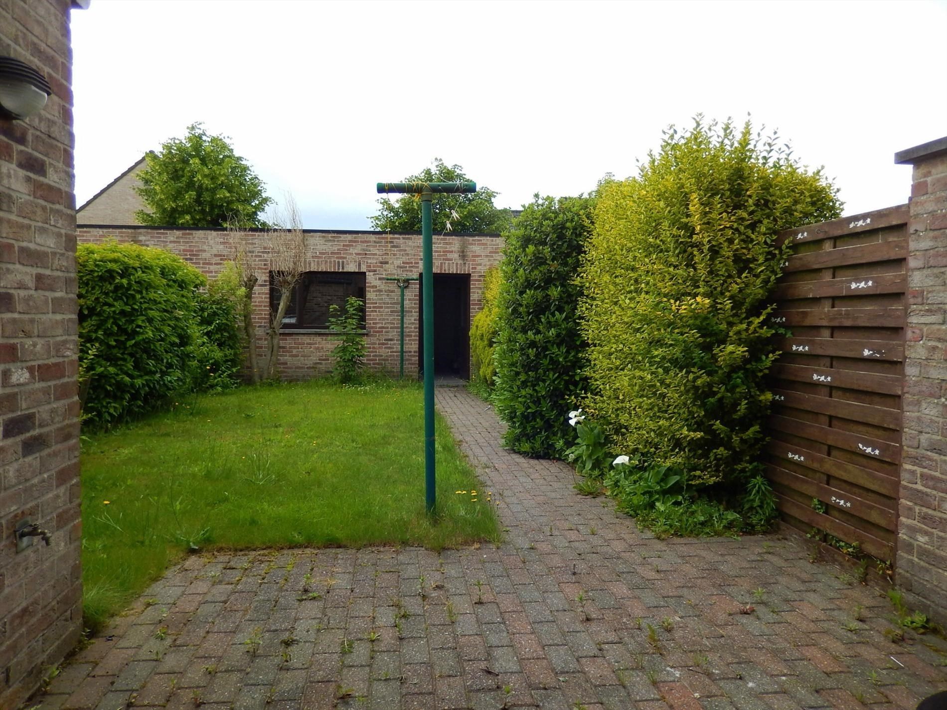 Gezellige rijwoning met dubbele garage foto 17