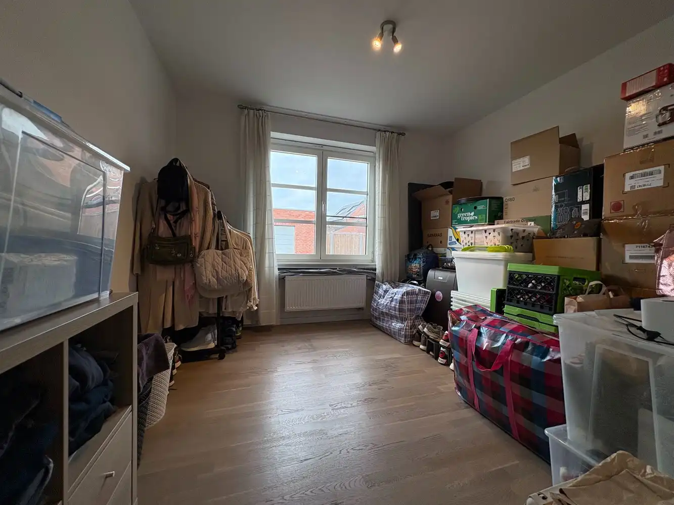 Gelijkvloers appartement met twee slaapkamers + autostaanplaats foto 7