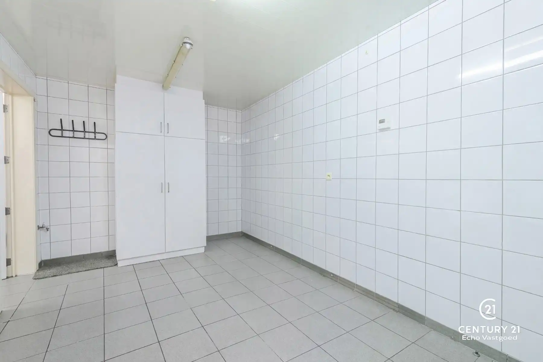 Handelszaak met gerenoveerde woonst op topligging  foto 3