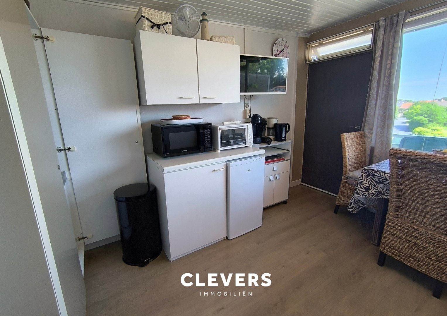 Op te frissen vakantieappartement met zonnig terras foto 9