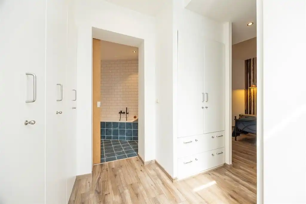 Unieke woning met eclectische gevels en dakterras foto 18