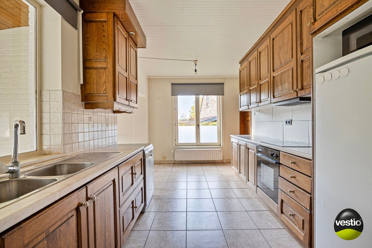 RUSTIG GELEGEN SPLIT LEVEL WONING OP 21A10CA TE KORTESSEM. foto 9