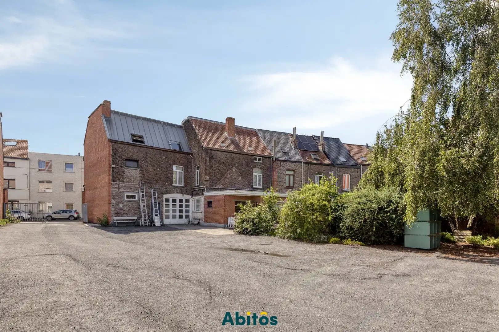Opbrengsteigendom met 2 woningen, loods en garage in Gent foto 3