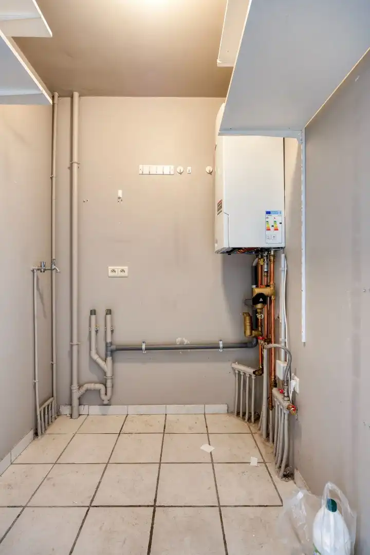 Appartement met 2 SLPKS en garage op gunstige locatie in het centrum. foto 15