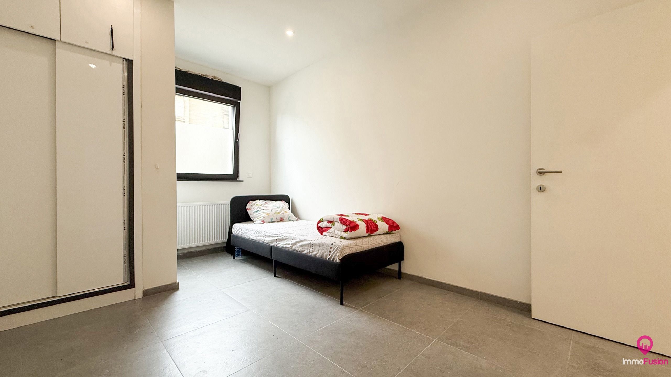 Gelijkvloers appartement met terras en kelder in hartje Zolder! foto 10