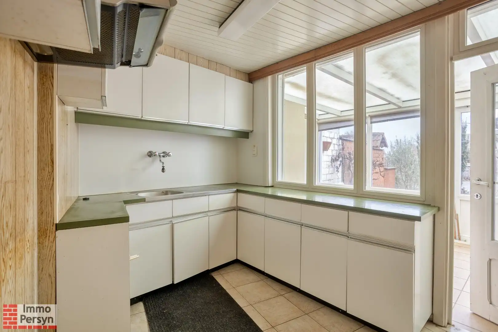 Te renoveren woning met 3 (mogelijks 4) slaapkamers en tuin met uitweg foto 6