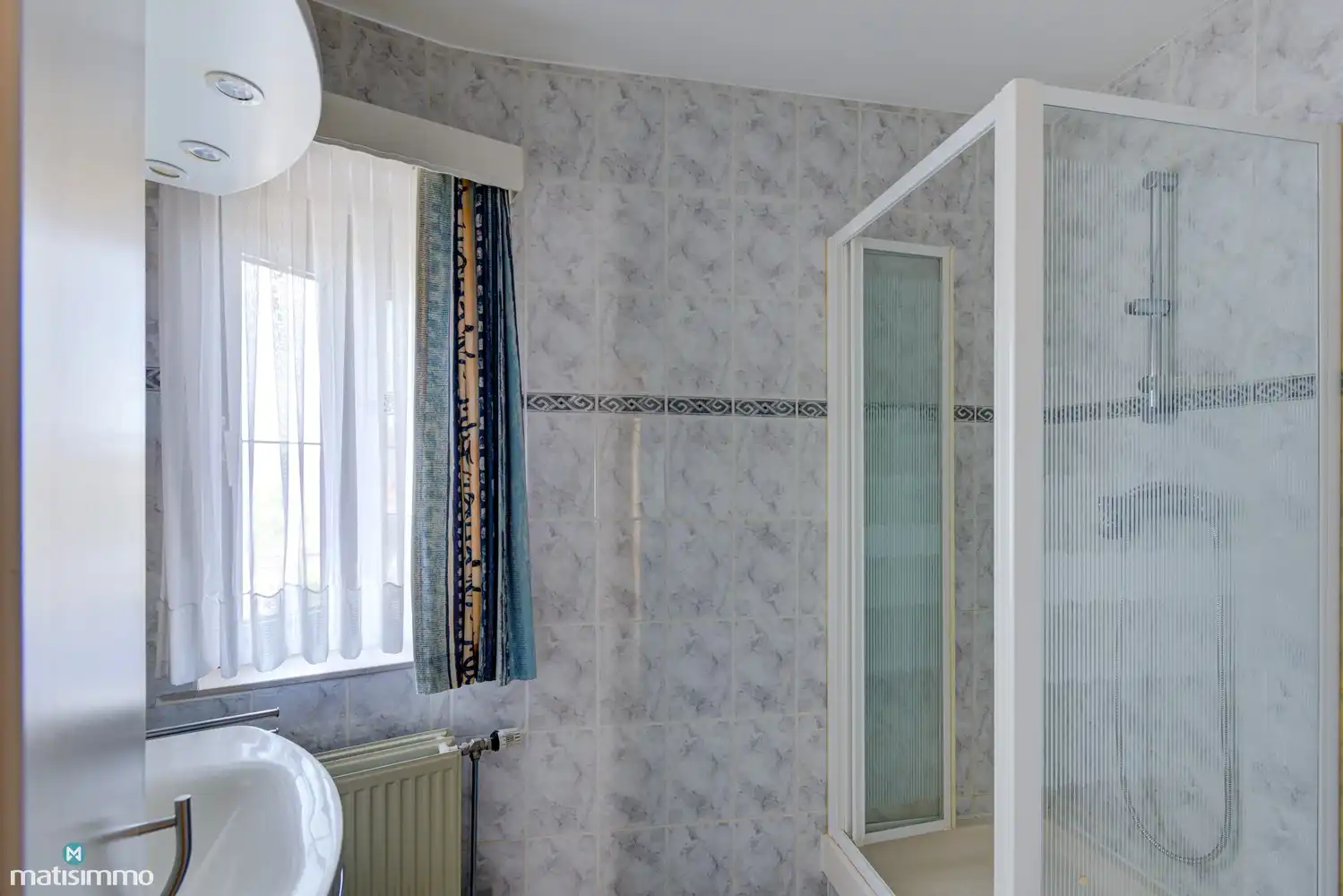 RUIM APPARTEMENT MET 3 SLAAPKAMERS, BALKON, KELDERBERGING EN GARAGEBOX IN BEVERST foto 14