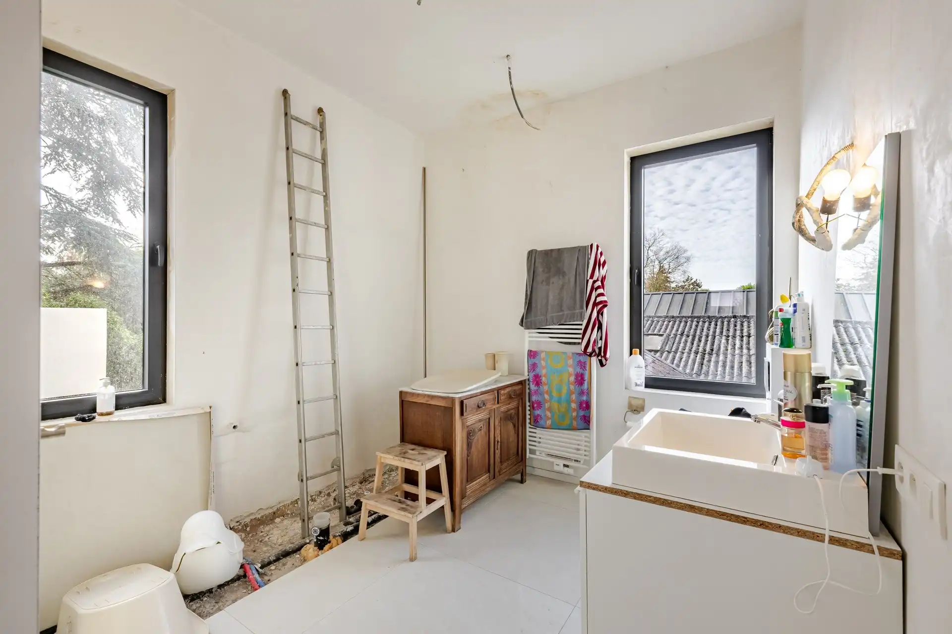 Karaktervol herenhuis met art-decoallure, ruime magazijnen en zuidgerichte tuin  foto 17