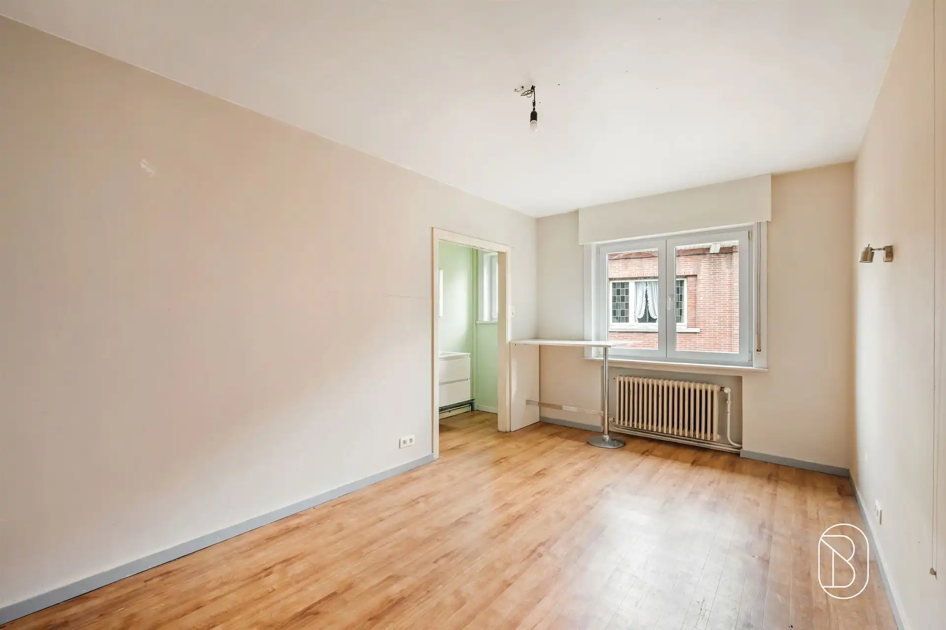 Groot huis met opslagruimte in het hart van Moeskroen foto 14