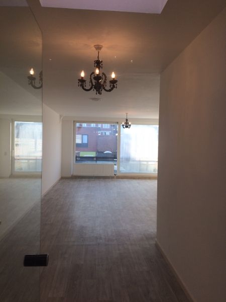 OPBRENGSTEIGENDOM, Handelspand met duplex appartement foto 11