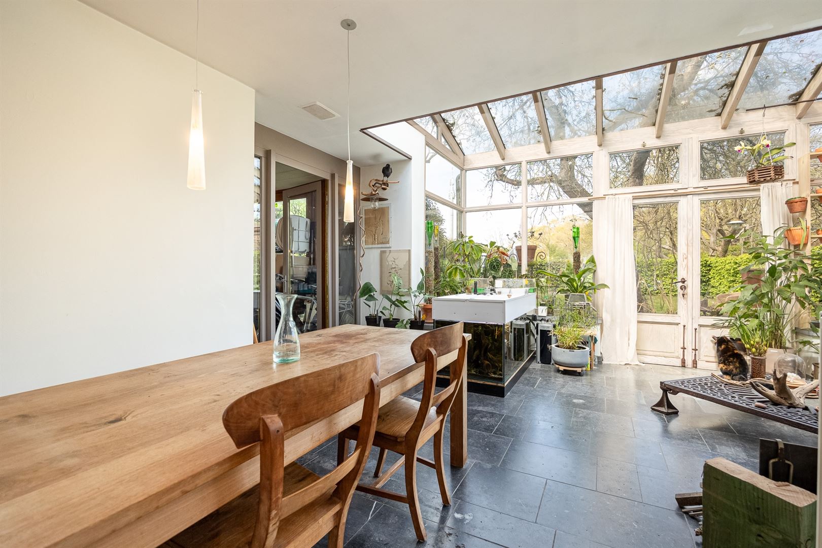 Charmante woning met orangerie en grote, sfeervolle tuin.  foto 8