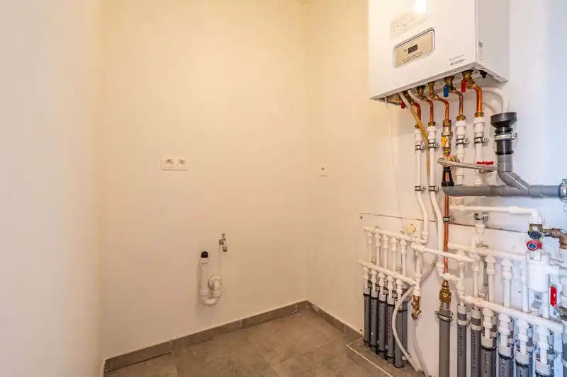 Jong, energiezuinig en modern tweeslaapkamer appartement met mooi terras op de tweede verdieping van residentie Aimé en André in hartje Waregem! foto 11