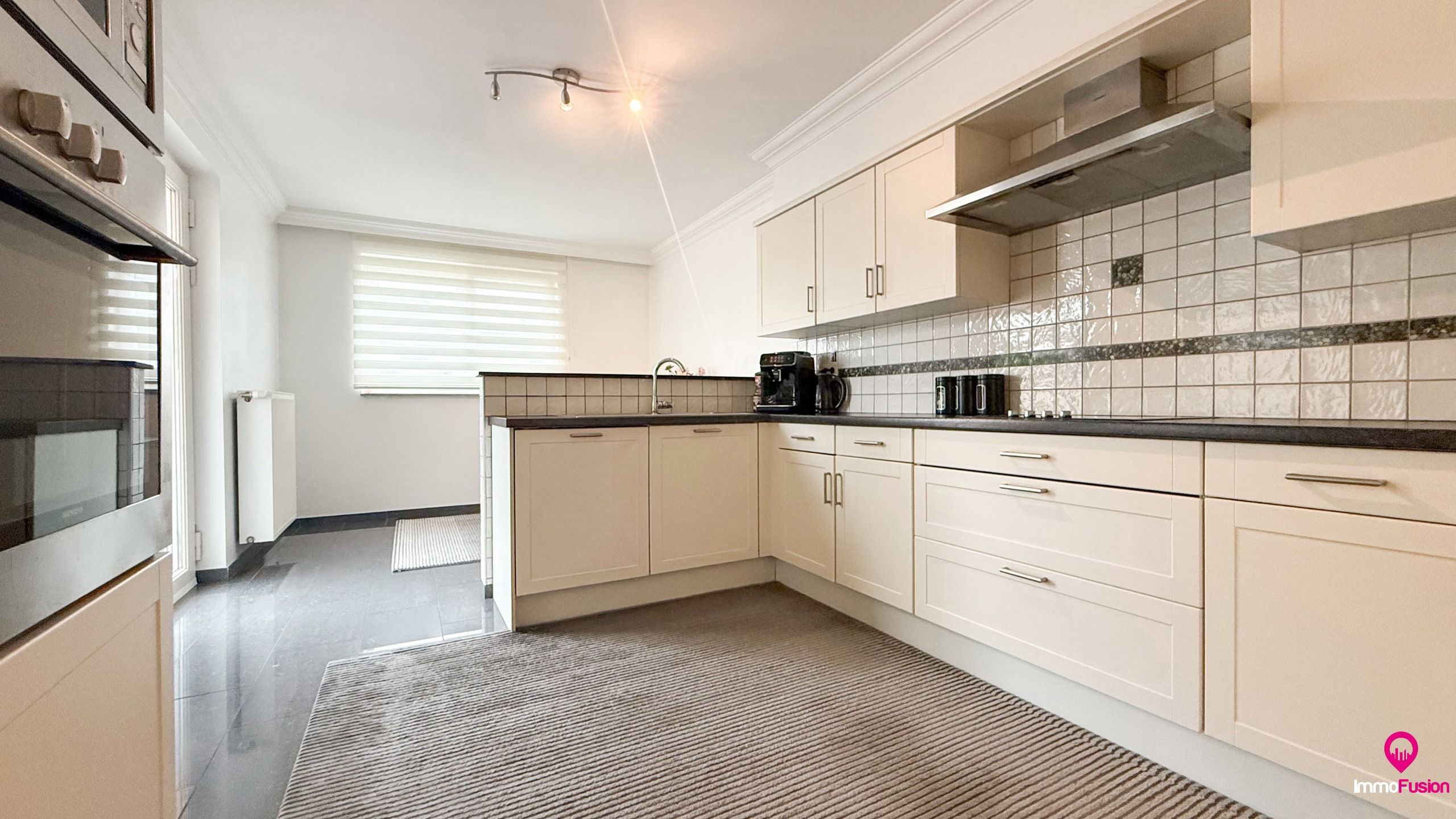 Instapklare woning met 3 slpks, tuin en garage in Lillo! foto 16