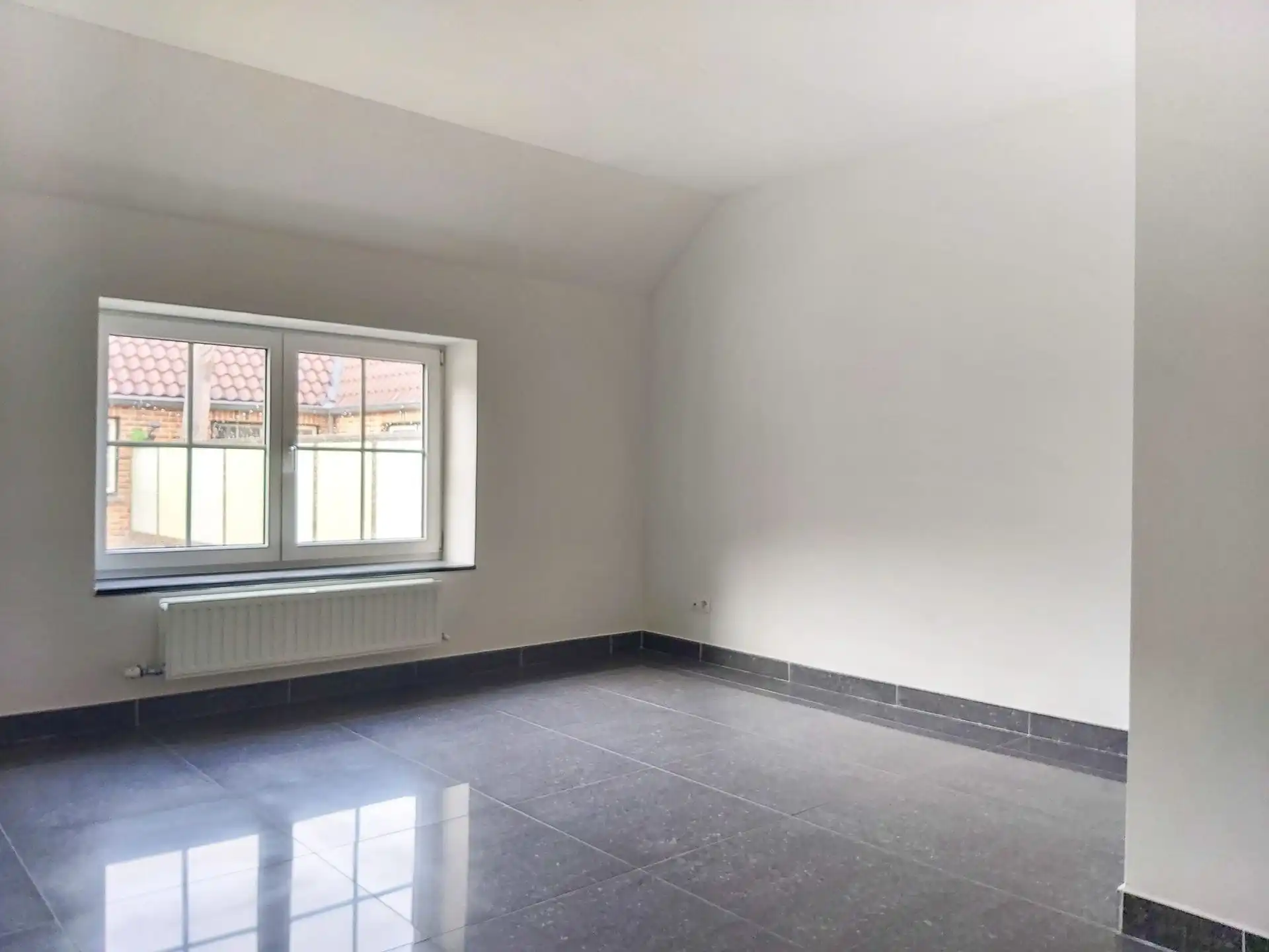 Ruime triplex met studio te koop in Opgrimbie! foto 14