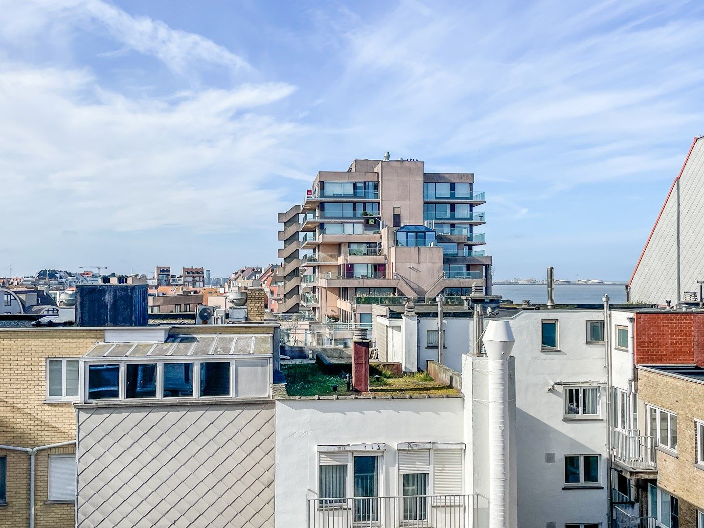 Duplex dakappartement met mooi zeezicht en 2 zonneterrassen gelegen aan het Lichttorenplein. Garage te koop foto 14