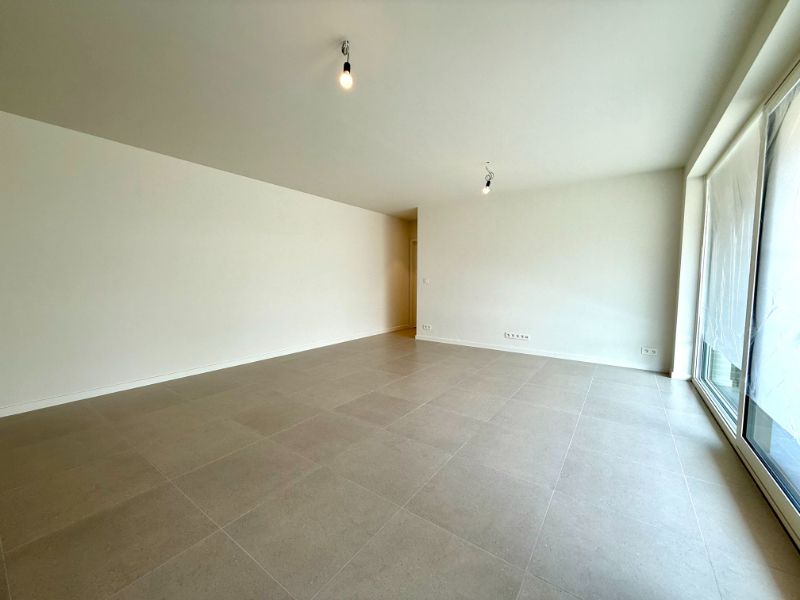 Gelijkvloers nieuwbouwappartement met 1 slaapkamer, zonnig terras en carport foto 7