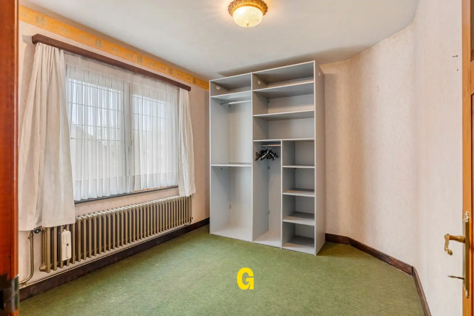 Te renoveren woning met 3 slaapkamers, inpandige garage en tuin foto 16