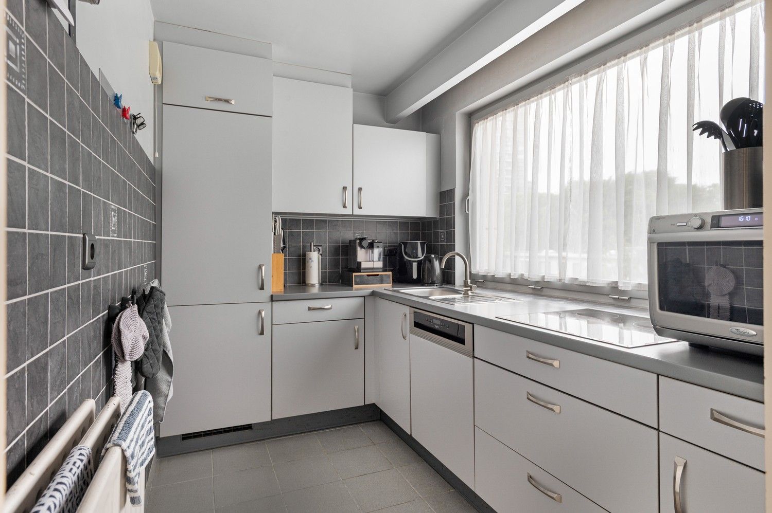 Gezellig appartement met 3 slaapkamers, een terras en garagebox in Deurne! foto 7