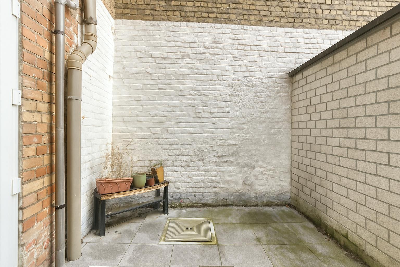 Huis met 4 slaapkamers en stadskoer in centrum Brugge  foto 8