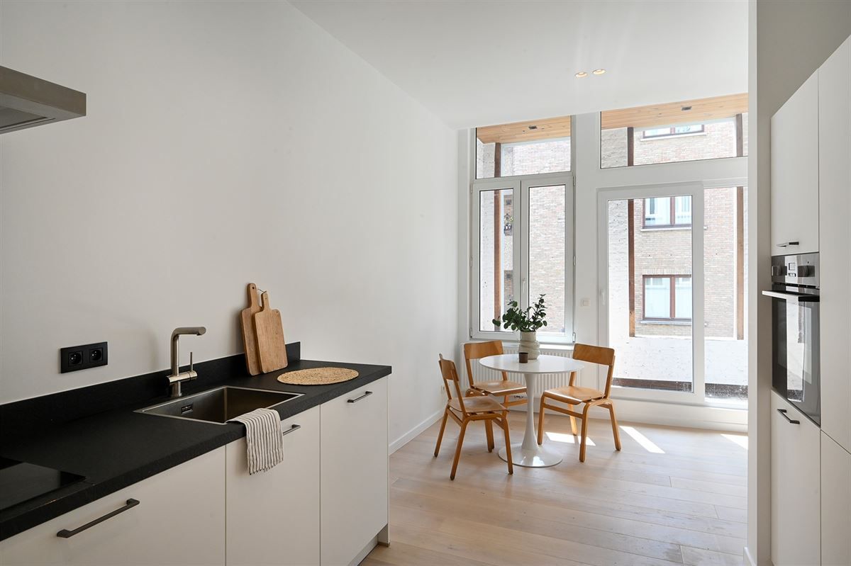 Volledig gerenoveerde opbrengsteigendom met 2 vergunde duplex-appartementen  foto 10