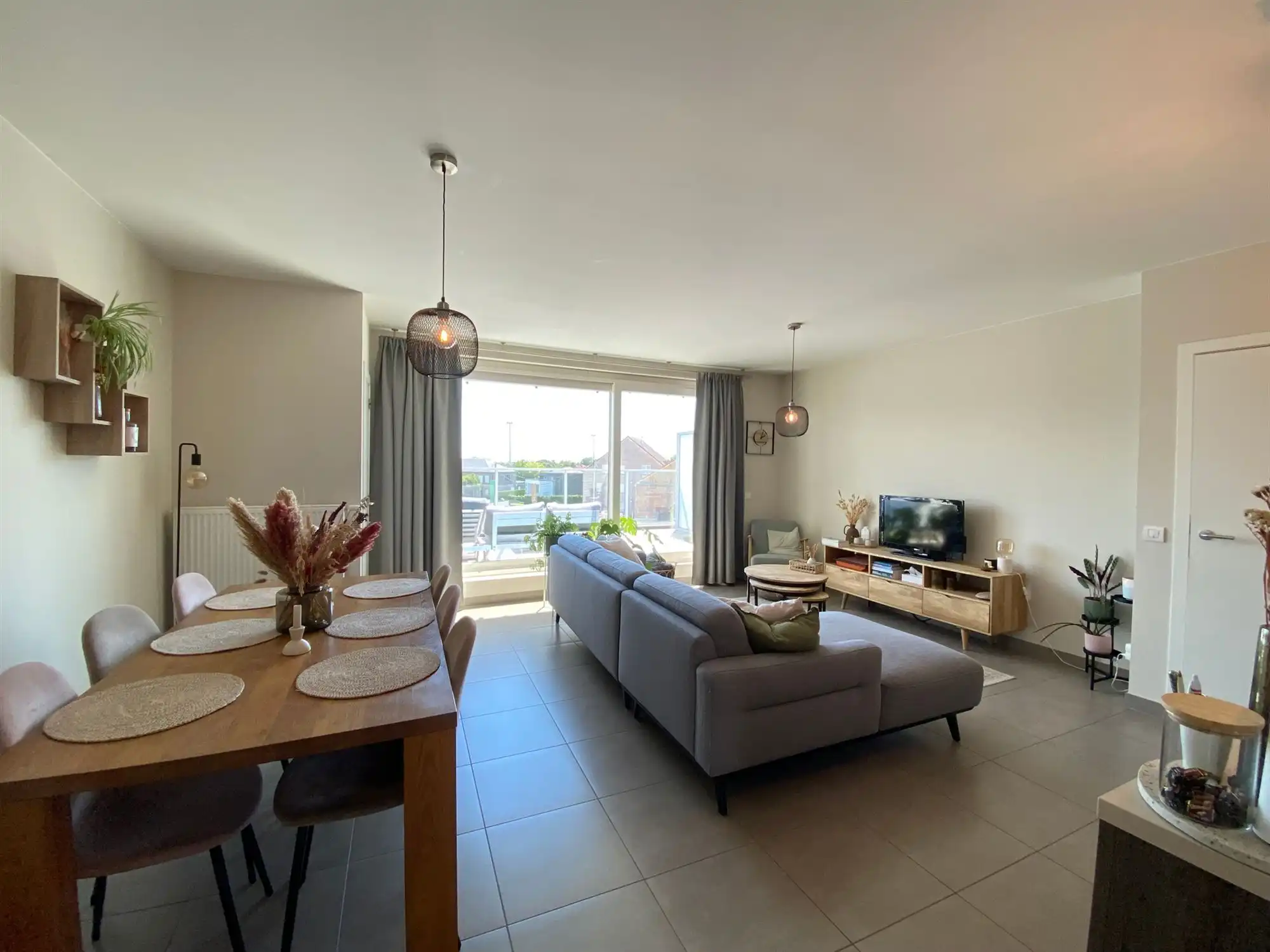Prachtig energiezuinig dakappartement met 2 slaapkamers, ruim zonovergoten terras en garage in hartje Ertvelde foto 3