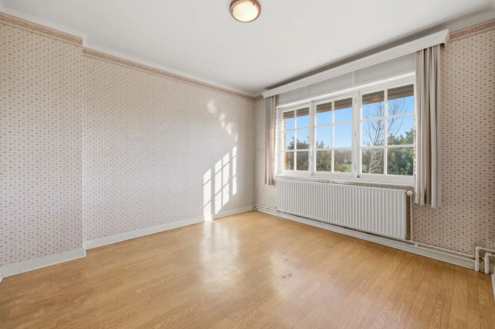 Op te frissen rijwoning met 2 slaapkamers en ruime tuin in Tienen foto 12