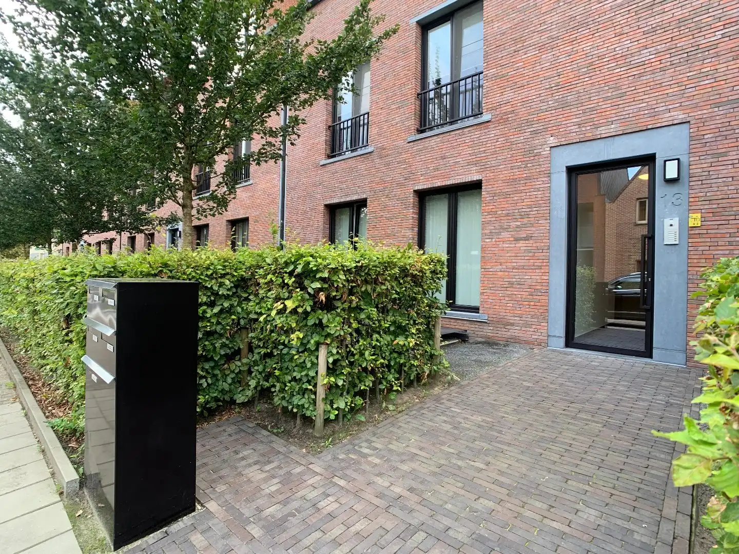 Recent gelijkvloers appartement met tuin, 2 slaapkamers en dressing foto 30