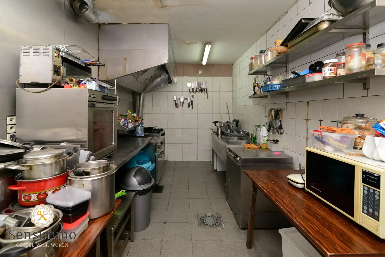 Handelsgelijkvloers met bovenliggend woonst foto 8