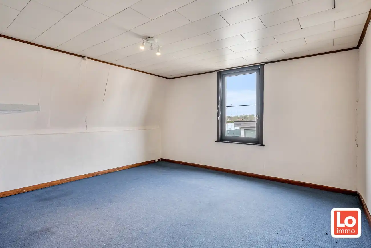 Leuke halfopen starterswoning met afzonderlijke garage en koertje op landelijke locatie in Mendonk. foto 13