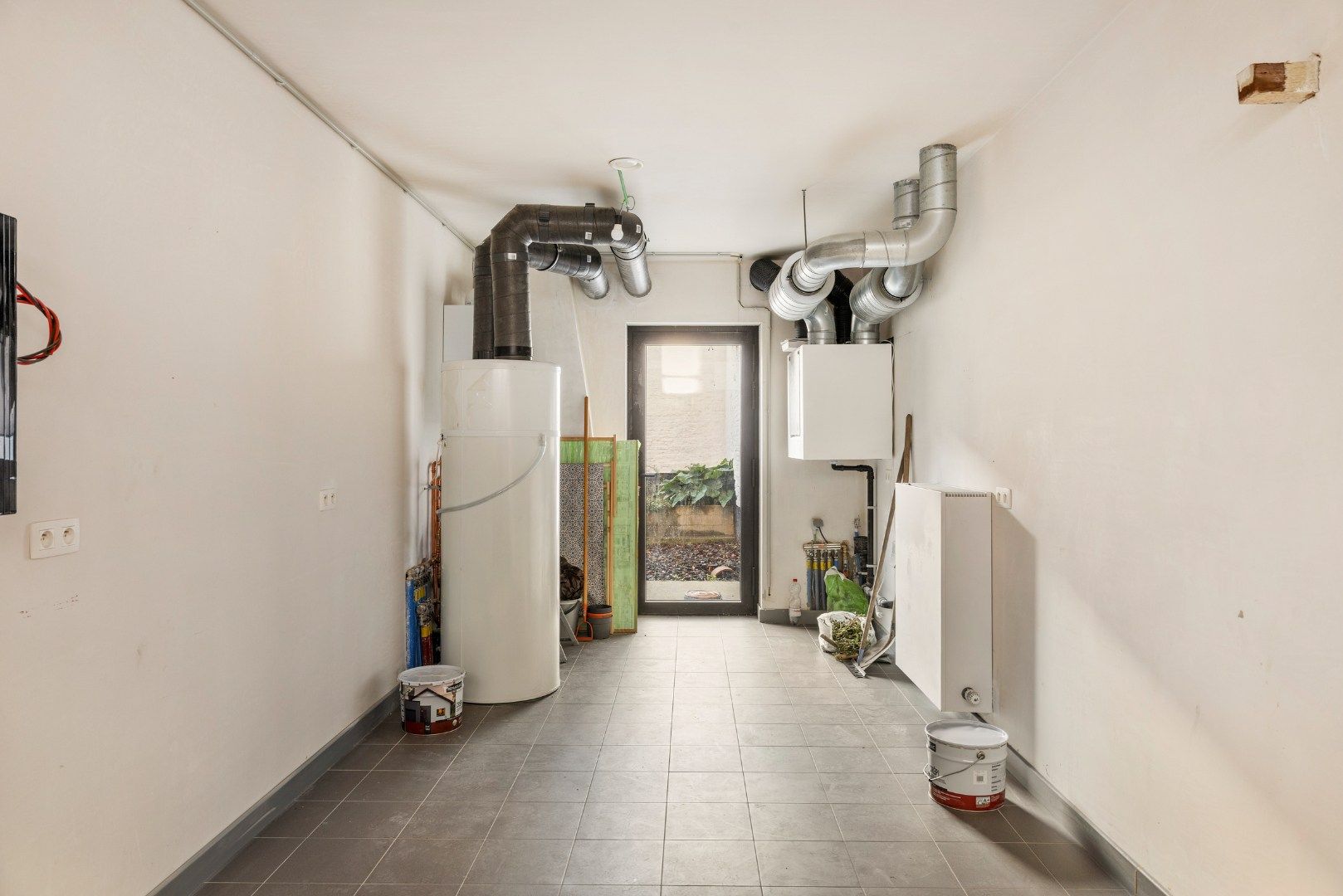 af te werken kangoeroewoning met binnentuin binnen de Brugse Reien foto 18