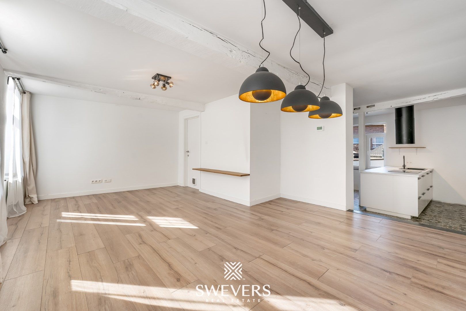 Ruim duplex appartement met knusse stadstuin in hartje Borgloon foto 2